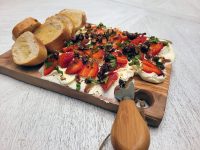 marscpone butter board with strawberries, basil and balsamic vingar and toast points