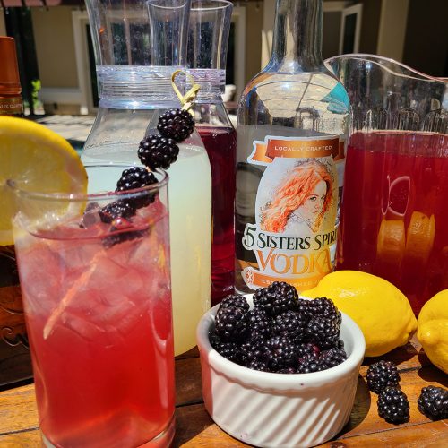 Oaks Lilly Punch with cranberry, lemonade, blackberries, vodka, orange liquer