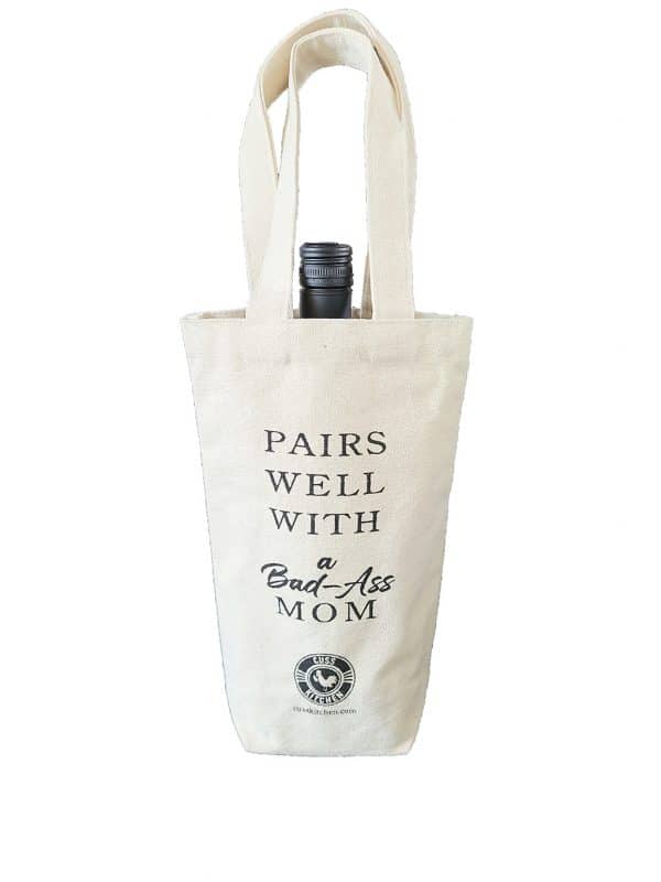 Canvas wine bag that says "Pairs Well With a Bad-Ass Mom"