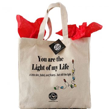 Canvas gift bag that says "You are the light of my life...a little dim, faded, and flickery...but still the light"