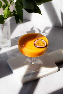Frozen-pornstar-martini with a fruit slice