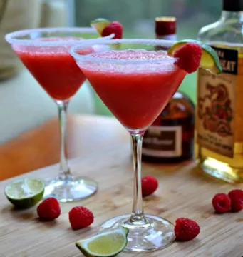 raspberry margarita in a martini glass recipe by SmallTownWoman.com