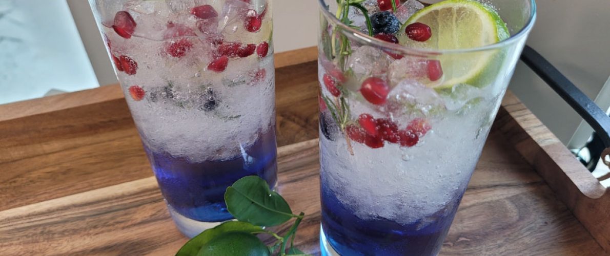 moonshine cocktail with butterfly pea flower tea