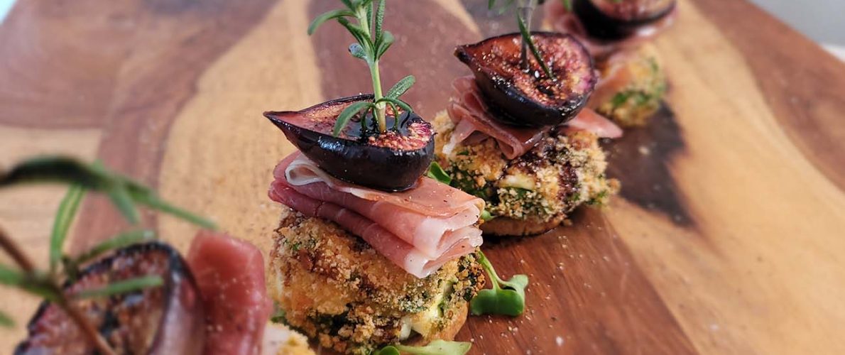 Garlic Round with Baked Goat Cheese, Prosciutto, Fig, and Rosemary